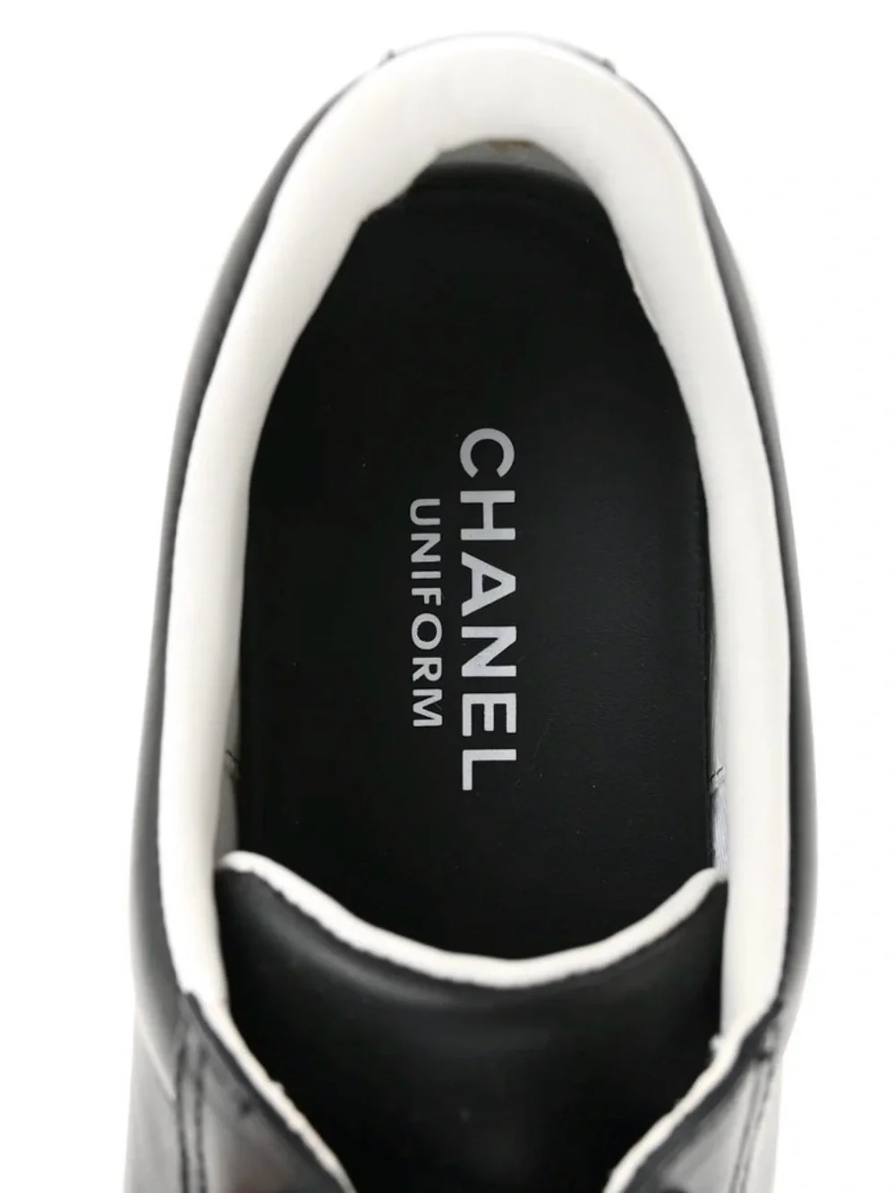 CHANEL Black Leather Low-Top Sneaker with White Sole